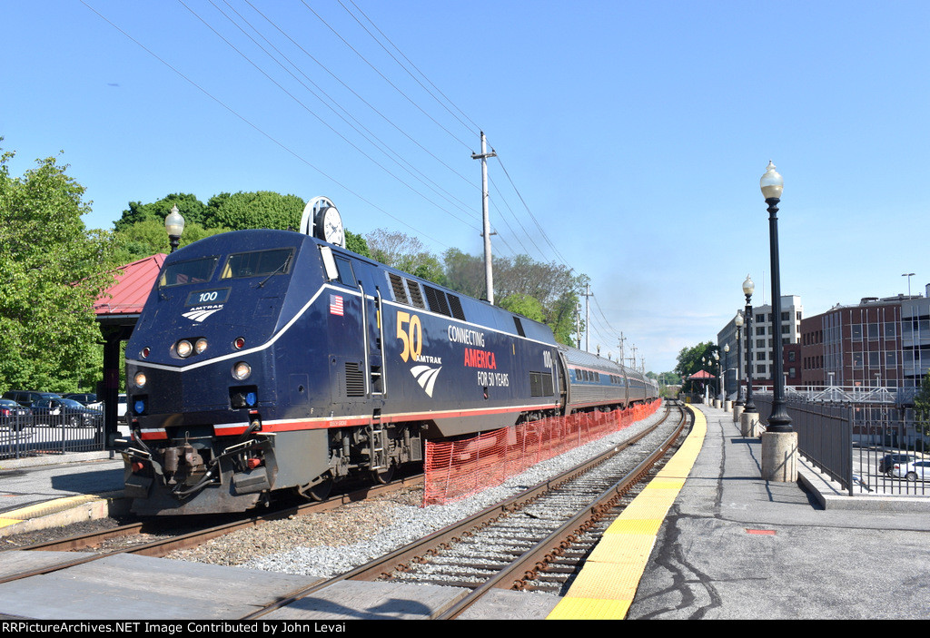 P42DC # 100 in the 50th Anniversary colors leads Amtrak Train # 682 out of Haverhill Station 